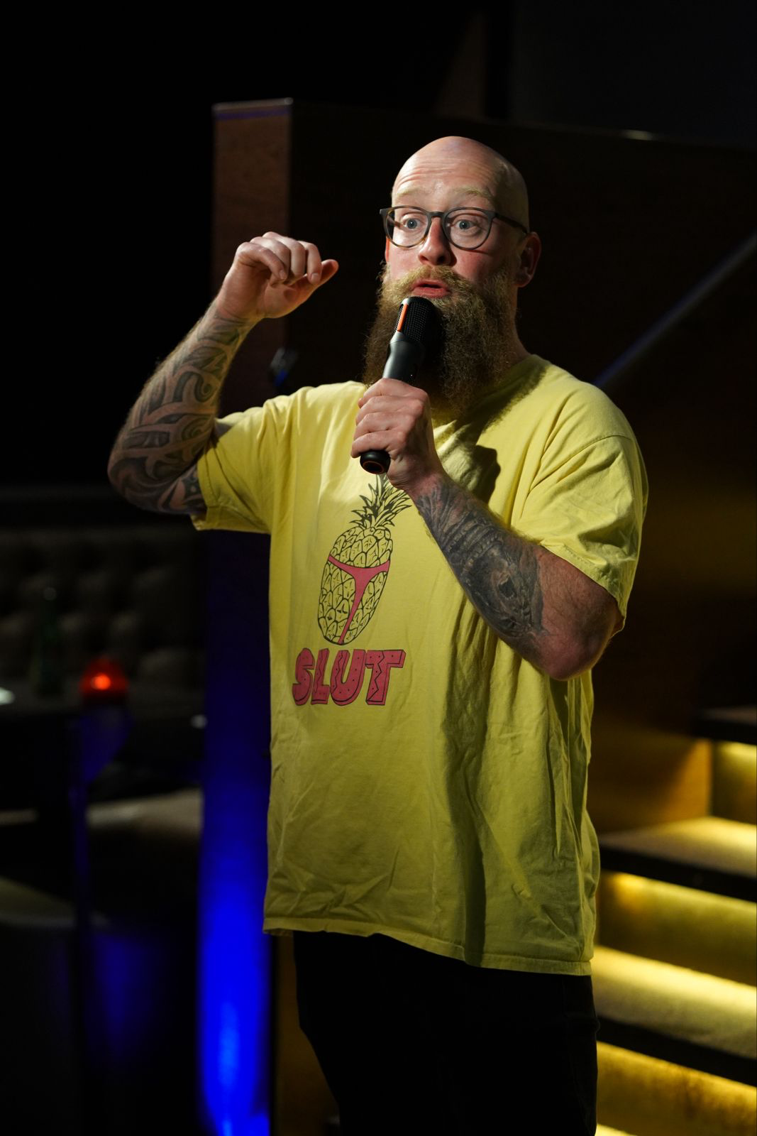 Dads Do Art artist speaking into a microphone